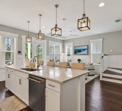 Your open-concept haven features a stunning kitchen island perfect for morning coffee and evening gatherings with loved ones.