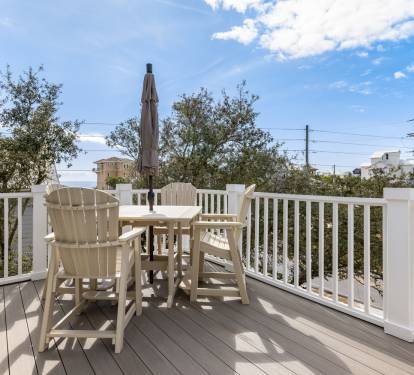 Step onto your private deck where comfortable Adirondack chairs invite you to savor morning coffee or evening relaxation under open skies.