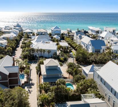Charming coastal community with private pools just steps from pristine turquoise waters and white sand beaches.