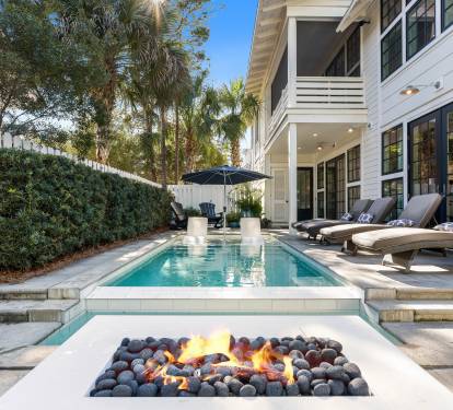 Dive into your private pool then warm up by the fire pit while lounging poolside under swaying palms.