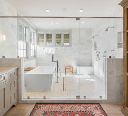 Luxurious spa-inspired bathroom with marble shower, soaking tub, and elegant finishes for your perfect retreat.