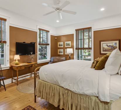 Unwind in your cozy bedroom with warm earth tones, crisp linens, and charming touches that create the perfect retreat.