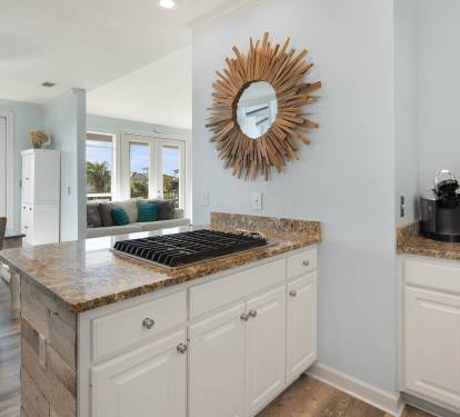 Your open-concept kitchen flows beautifully into the living space, featuring granite countertops and modern appliances for effortless meal preparation.