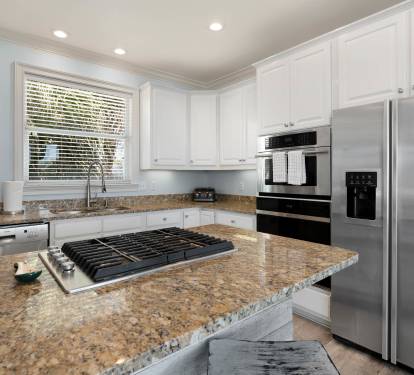 Your fully equipped kitchen features granite countertops, stainless steel appliances, and everything you need to create memorable meals during your stay.