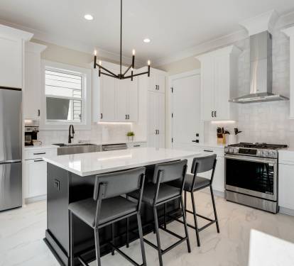 Your gourmet kitchen awaits with sleek white cabinets, granite counters, and stainless steel appliances for memorable home-cooked meals.