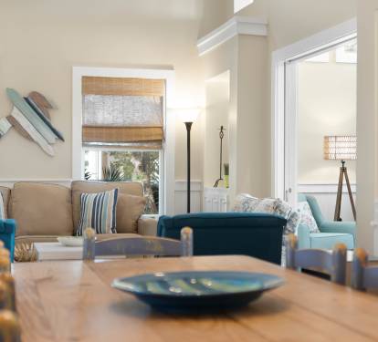 Relax in your bright, airy living space where coastal blues meet warm neutrals, creating the perfect atmosphere for peaceful moments together.