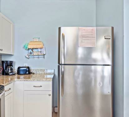 Your fully equipped kitchen features stainless steel appliances and granite countertops for easy meal preparation.