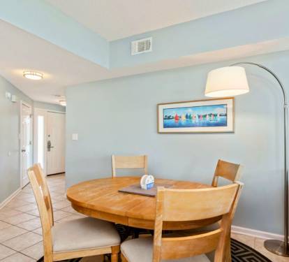 Gather around your bright dining space with comfortable seating for four and modern touches that make every meal feel special.