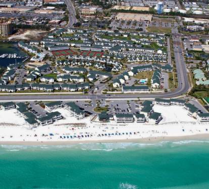 Stunning beachfront location with pristine white sand beach and emerald Gulf waters at your doorstep.