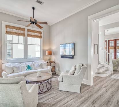 Living Room - Equipped with a Plush Sofa and Flat-Screen TV