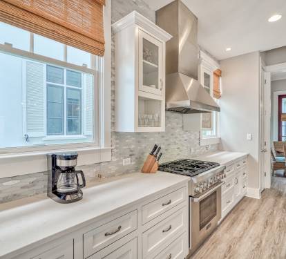 Kitchen - Featuring a Six Burner Gas Range