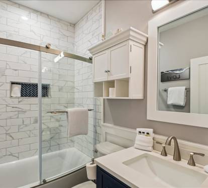 1st Floor Guest Bathroom - Featuring a Walk-in Shower