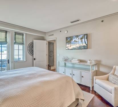 Primary Suite - Providing Private Access to the Spacious Balcony