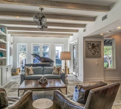 Living Room - Featuring Ample Seating & a Baby Grand Piano!