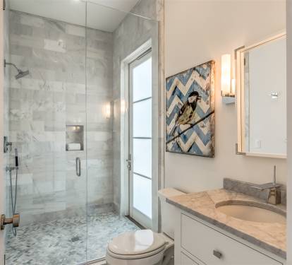 1st Floor Guest Bathroom - Featuring a Single Vanity & Walk In Shower
