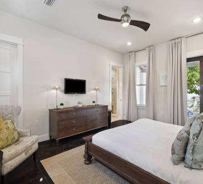 Primary King Suite - Courtyard Access & Flat-Screen TV