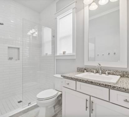 1st Floor Shared Bathroom Equipped with Walk In Shower & Single Vanity