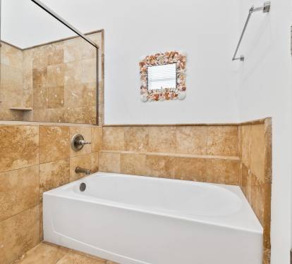 Second Floor ?Primary Ensuite - Featuring a Walk-in Shower and Soaking Tub