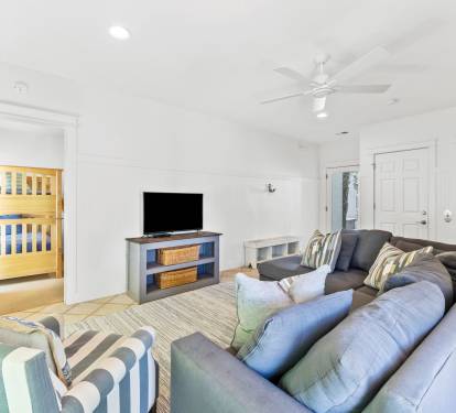 First Floor Living Area - Equipped with a Large Flat Screen TV