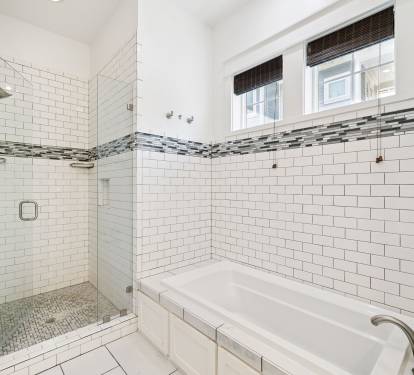 Primary King En-Suite - Soaking Tub + Walk-In Shower