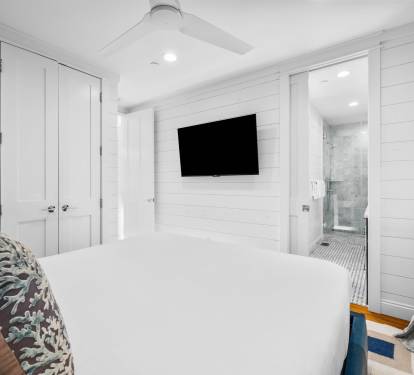Carriage House Bedroom - Furnished with a King Size Bed