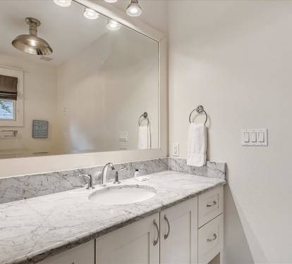 Guest En Suite - Featuring a Tub-Shower Combo & Single Vanity