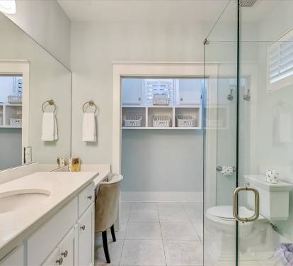 1st Floor Primary En Suite - Equipped with a Single Vanity & Make Up Station.