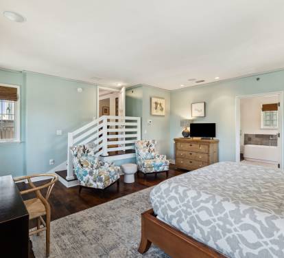 Primary King Suite - Dedicated Workspace, Sitting Area & Flat-Screen TV