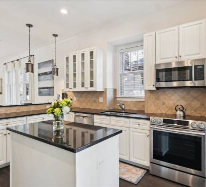 Kitchen - Equipped with Stainless Steel Appliances