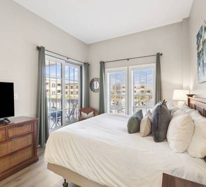 Primary King Suite - Balcony Access + Flat-Screen TV