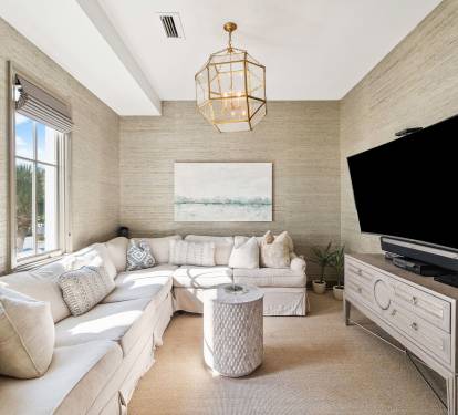 Family Room with Ample Seating & Large Flat-Screen TV