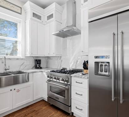 Kitchen - Featuring a Wolf Gas Range