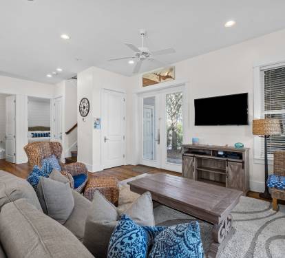 1st Floor Living Area - Equipped with a Large Flat Screen TV