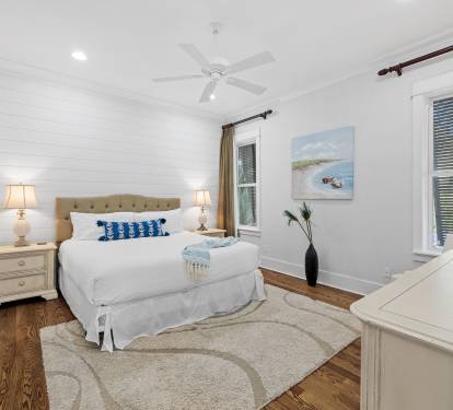 1st Floor Primary Suite - Equipped with a Large Flat Screen TV
