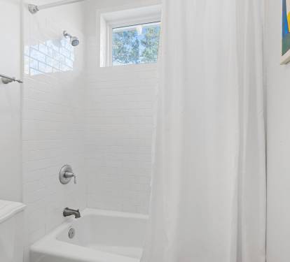 2nd Floor Jack and Jill Bathroom - Equipped with a Tub/Shower Combination
