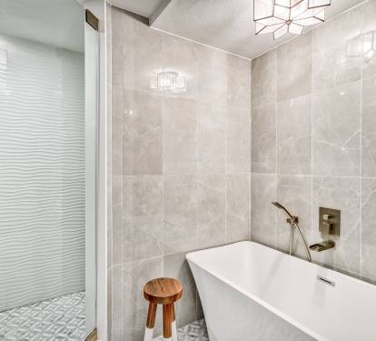 Primary King En-Suite - Oversized Soaking Tub + Walk-In Shower