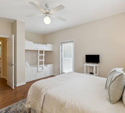 Queen Guest Suite - Equipped with a Twin Bunk & Balcony Access