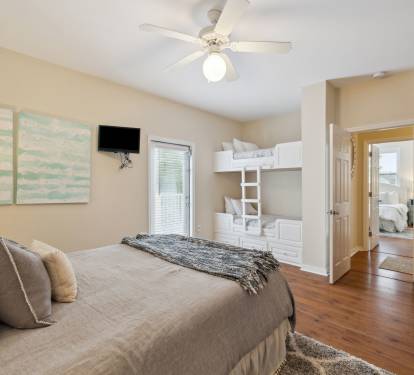 Queen Guest Suite - Equipped with a Twin Bunk & Balcony Access