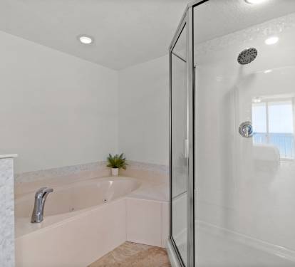 Primary King En-Suite - Soaking Tub + Walk-In Shower