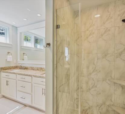 A calming primary bathroom en-suite, perfect for unwinding after a day out