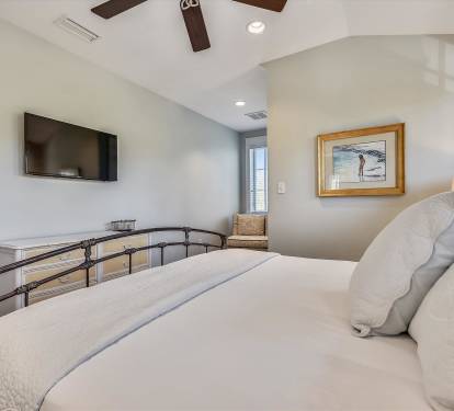 Cozy second floor king guest room, perfect for recharging after a day of exploring.