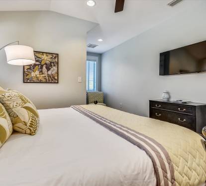 Natural light and soft tones create a peaceful bedroom retreat.