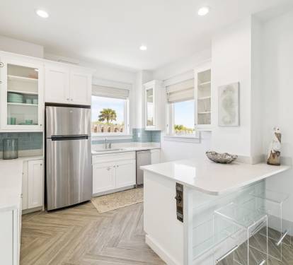 1st Floor Kitchen - Equipped with a Refrigerator & Ice Maker