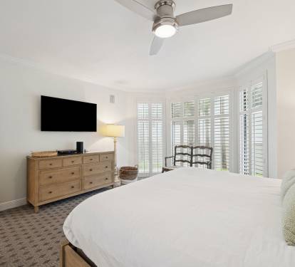 Primary King Suite - Equipped with a Flat-Screen TV