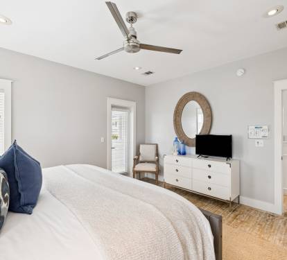 Primary King Suite - Balcony Access & Flat-Screen TV