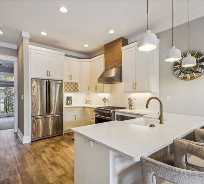 Updated Kitchen with Ample Counter Space and Bar Seating