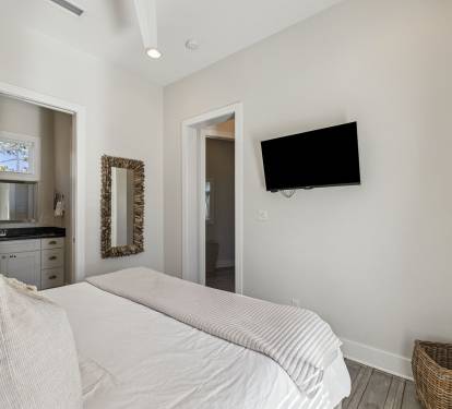 King Guest Suite - Balcony Access + Flat-Screen TV