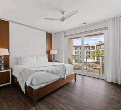 Primary King Suite - Private Balcony Access & Flat-Screen TV