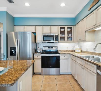 Fully Equipped Kitchen Offering Stainless Steel Appliances