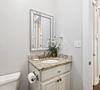 Powder Room - Conveniently Located off the Kitchen